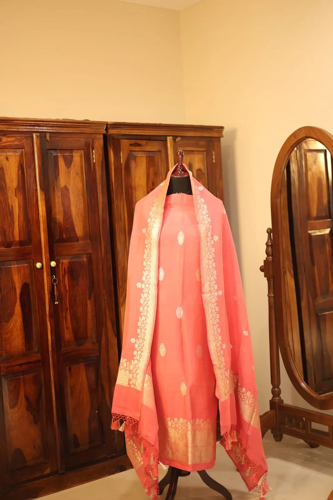 Coral Salmon Salwar Kameez with Polka Dots and Gold Trim